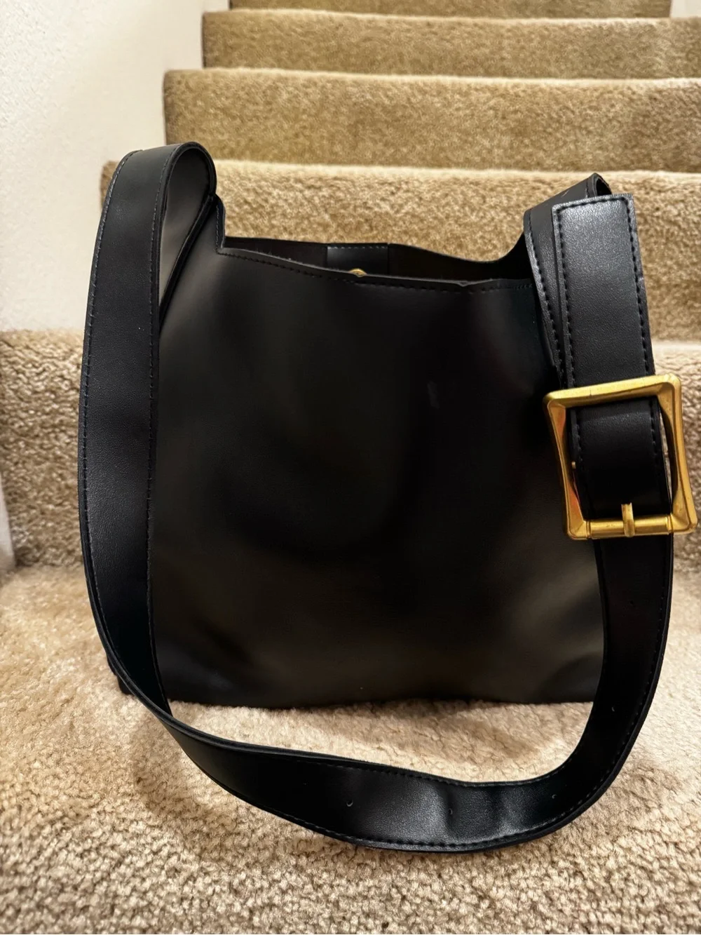 Elegant Black Leather Shoulder Bag with Gold Buckle